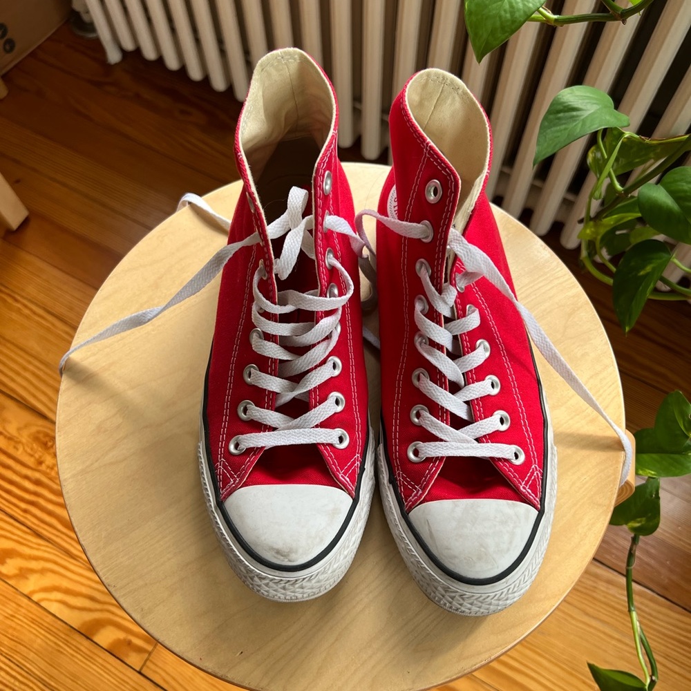 Red high top converse in great condition.